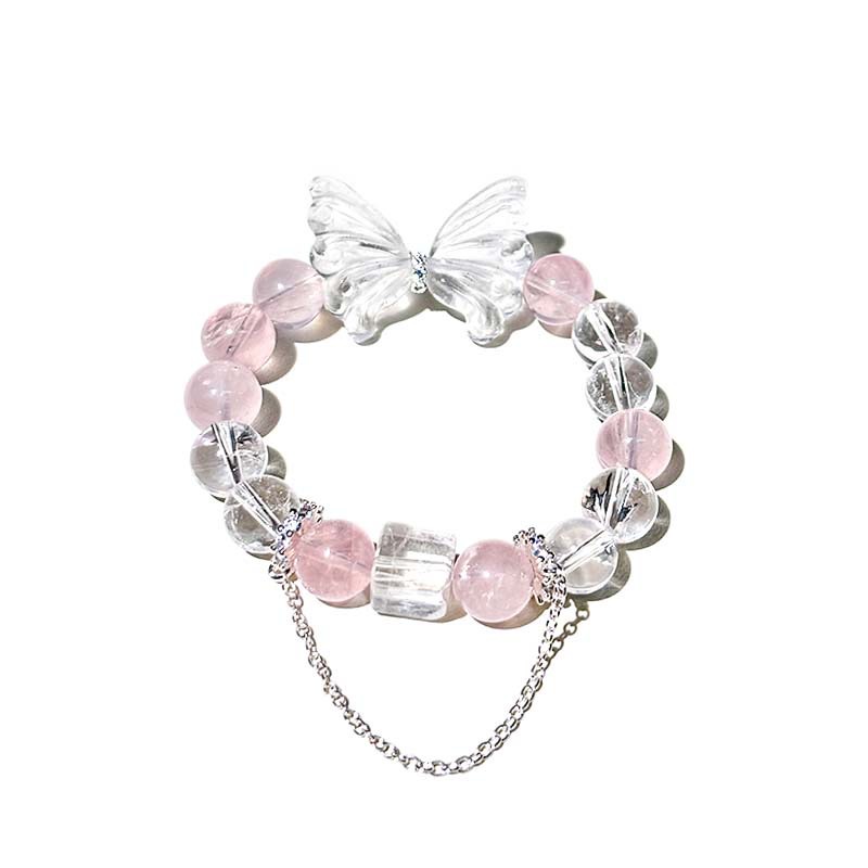 Pink crystal butterfly bracelet made with rose quartz and azeztulite gemstones