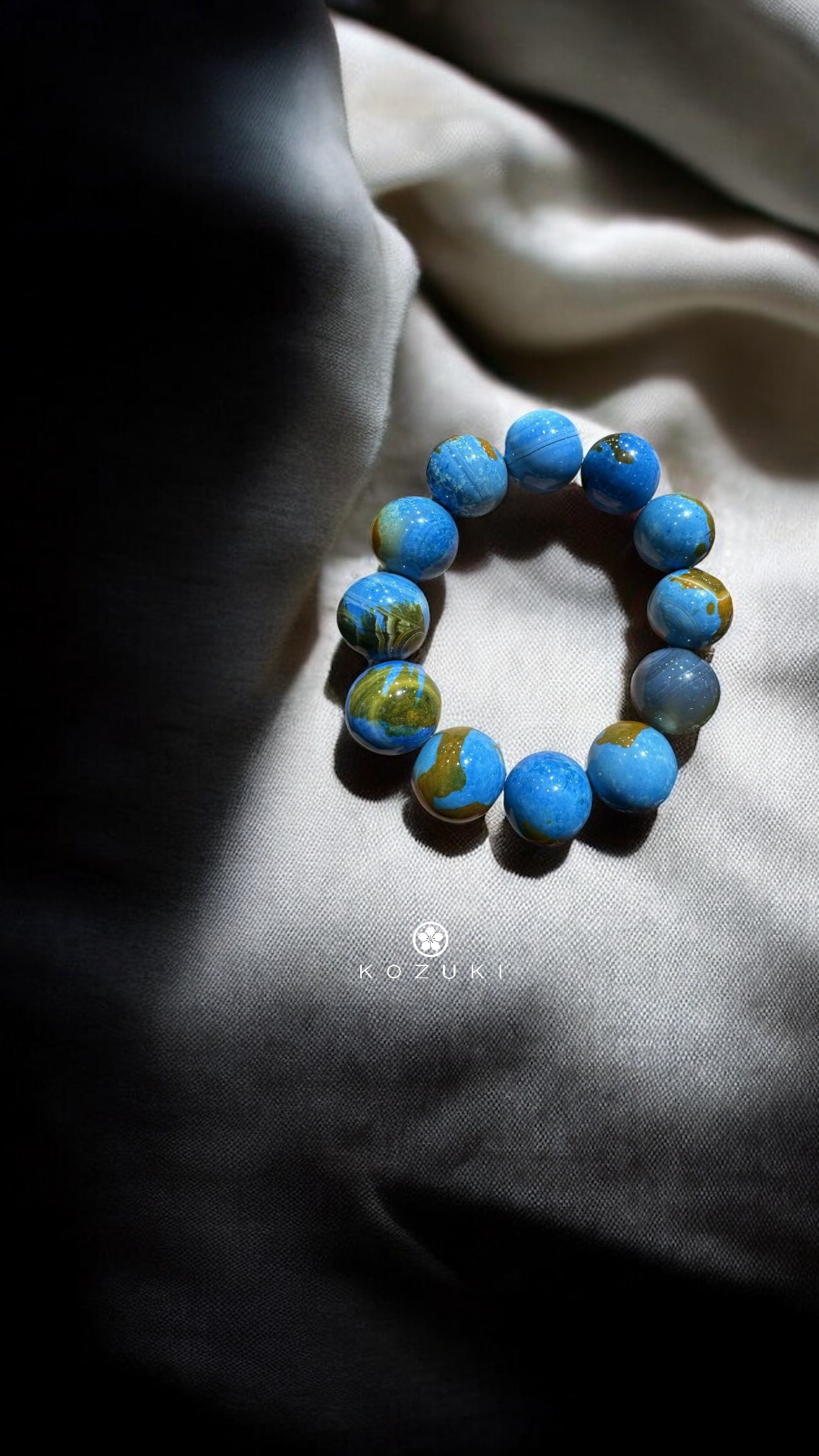 Spiritual gemstone bracelet with blue earth-patterned agate